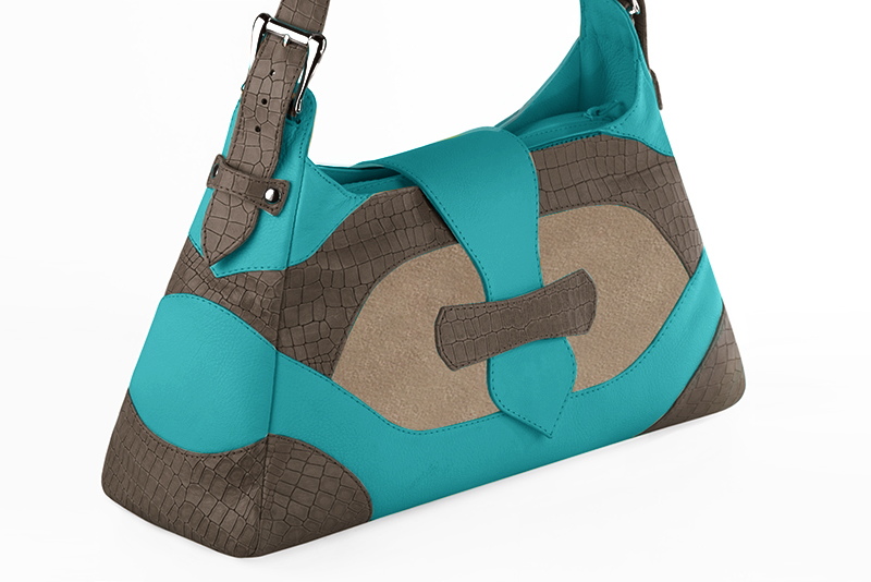 Turquoise blue and tan beige women's dress handbag, matching pumps and belts. Front view - Florence KOOIJMAN